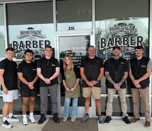 Hometown Barbershop storefront and team